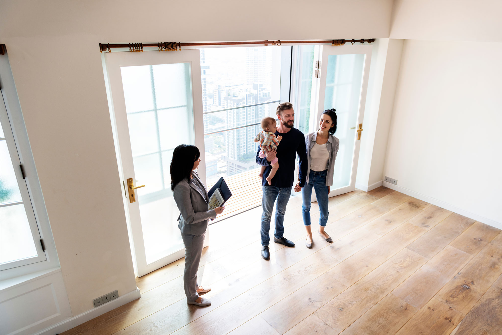 Real estate agent showing house