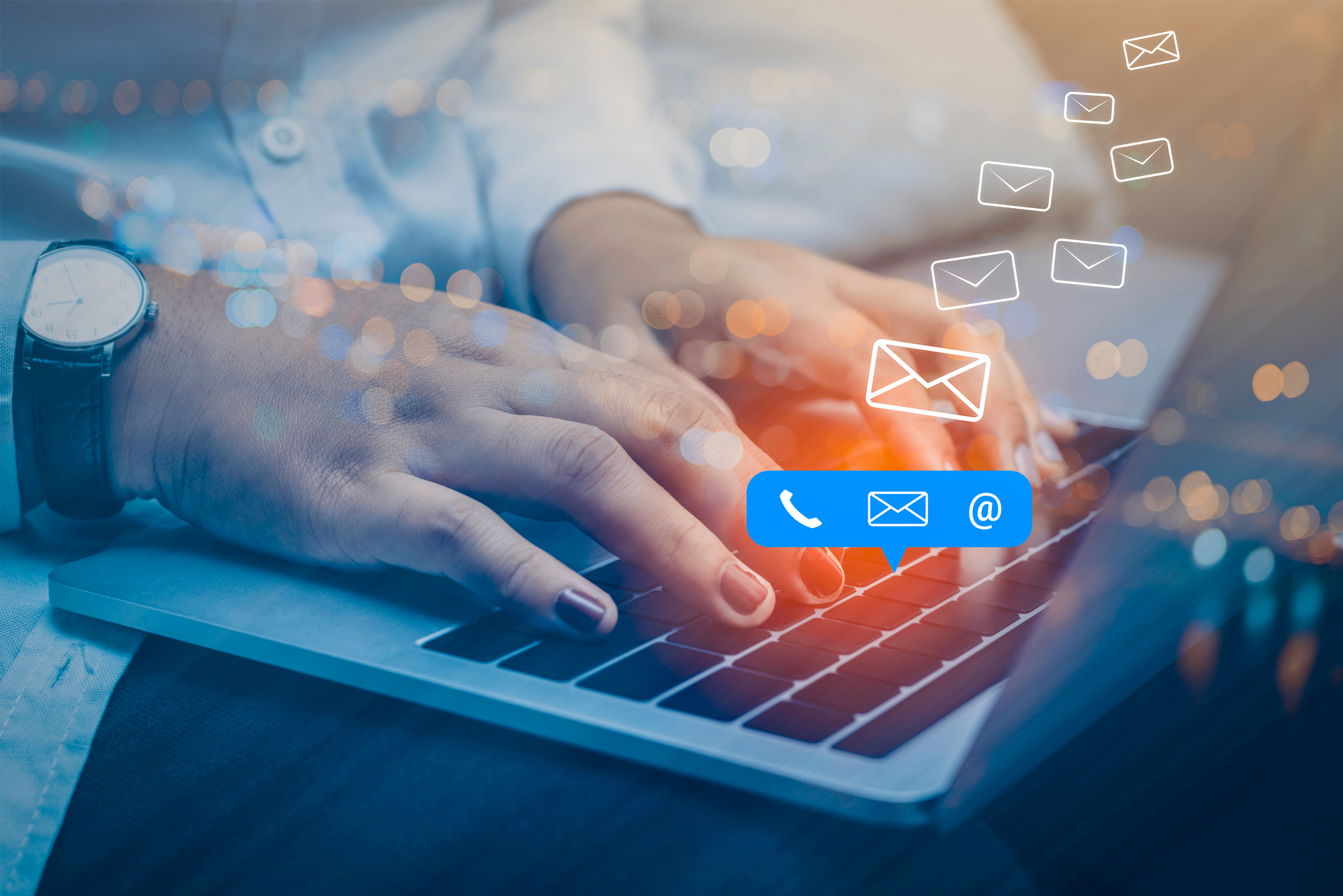 laptop image with email icons